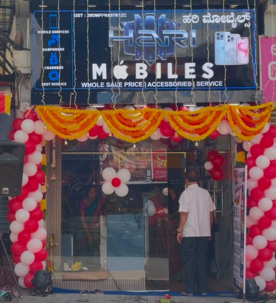 Hari Mobiles storefront with its blue illuminated sign